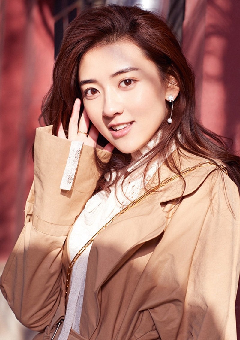 梁潔甜美優雅時尚街拍高清圖片