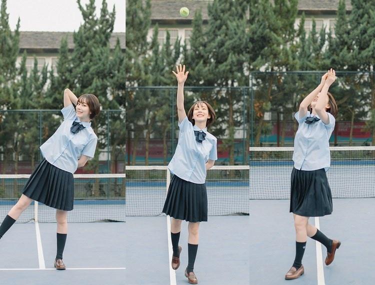 短發少女清純甜美戶外球場寫真圖片