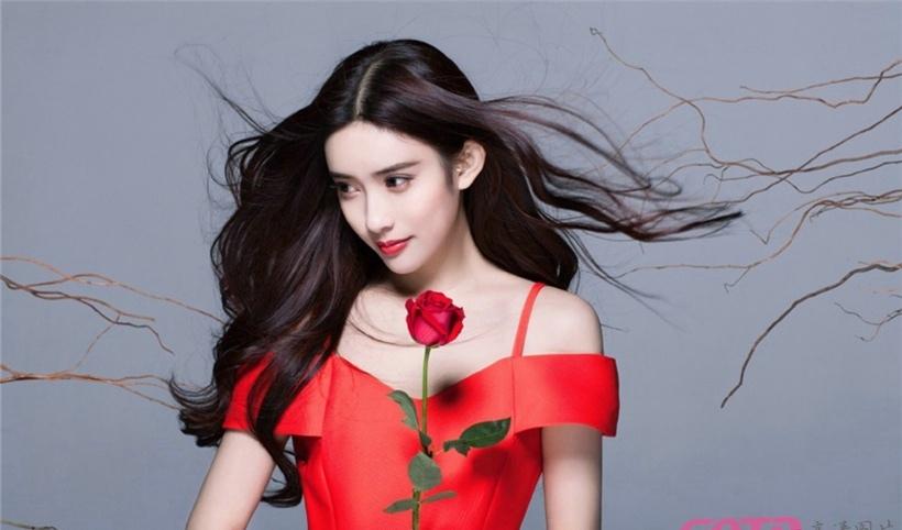 紅裙白皙美女散發(fā)玫瑰香
